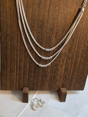 Triple-Strand Silver Layered Necklace with Bead Accents and Matching Earrings